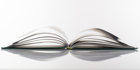 Book open on white background
