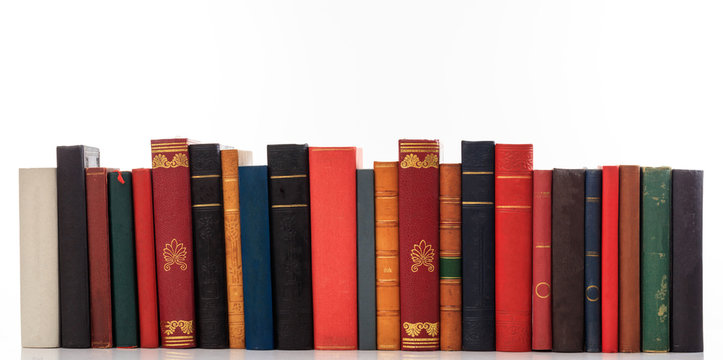 Vintage books on white background