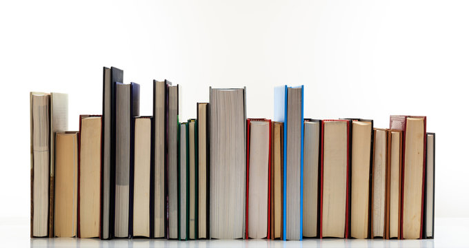 Books on white background - Powered by Adobe
