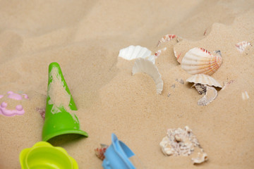 Fototapeta na wymiar Beach Toys In The Sand