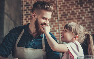 Dad and daughter cooking