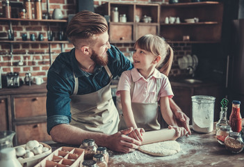 Dad and daughter cooking