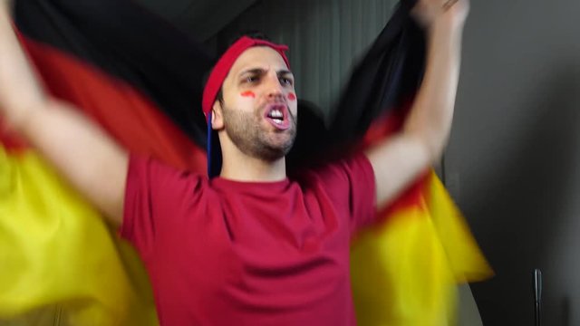 German Guy Waving Germany Flag