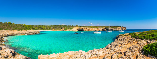 Panorama view of bay with boats at Cala Varques, beautiful seascape of Majorca, Spain Mediterranean...