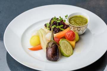 Steamed vegetables with mashed potatoes and sauce