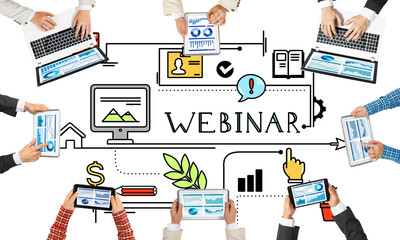 Top view of businesspeople sitting at table and using gadgets