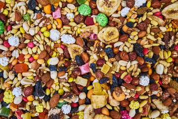 mix of  nuts and fruits. tropical trail mix. Nuts and candied fruits