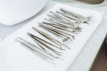 Clean dentist medical tools, background.