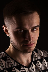 Obraz premium Stylish, handsome portrait of a young man
