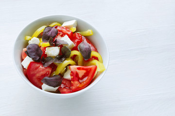 Delicious vegetable salad with feta cheese tomato and pepper