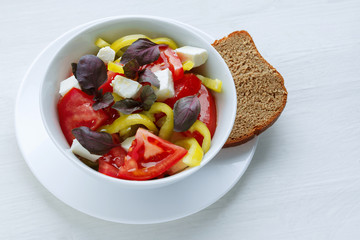 Delicious vegetable salad with feta cheese tomato and pepper