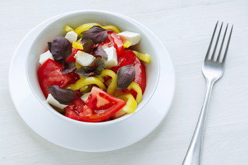 Delicious vegetable salad with feta cheese tomato and pepper