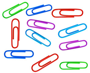 Set of different colored paperclips on a white background