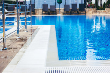 Part of the Pool with turquoise Water, Background.