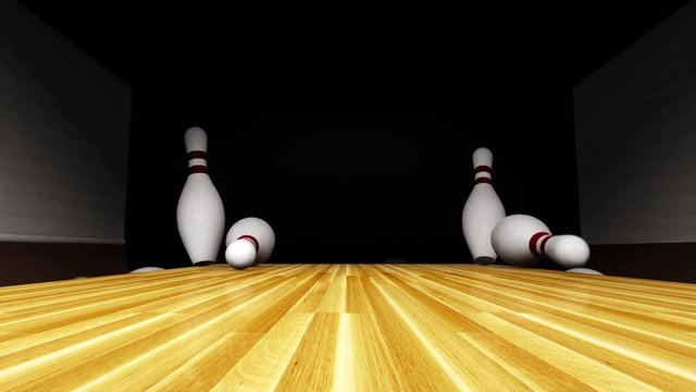 Bowling ball rolling down alley to hit a strike