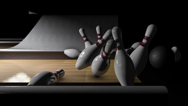 Bowling Ball Hitting Pins for a Strike
