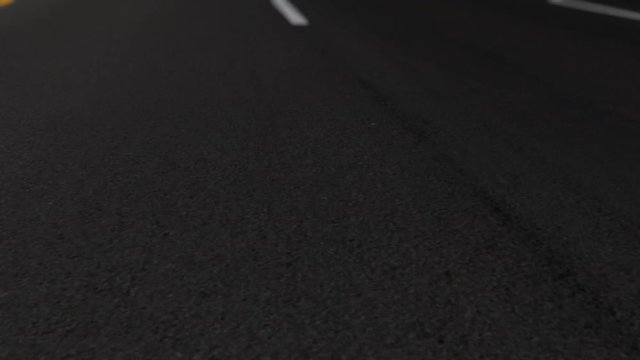 Driving down White Dashed Road
