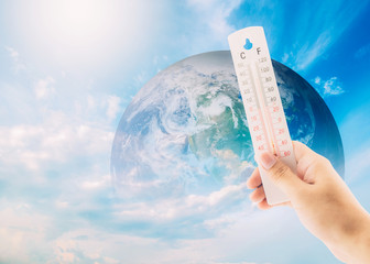 Thermometer check the earth's temperature with impact of global environment concept, Elements of...