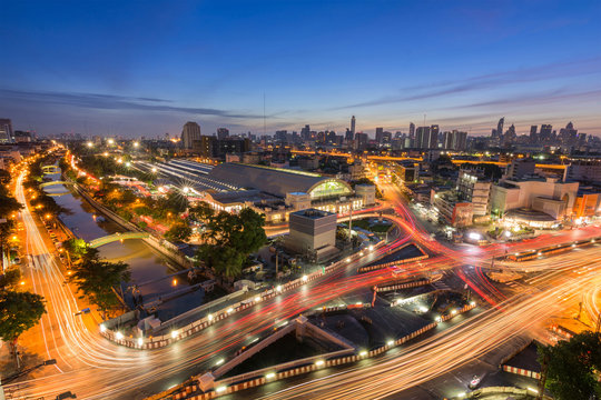 Aerial view cityscape of bangkok viewing in twilight moning bangkok train station or hua lamphong railway and traffic condition on Rama IV Rd. thailand.