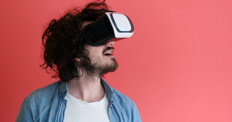 young man using VR headset glasses of virtual reality