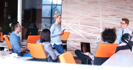 Startup Business Team At A Meeting at modern office building