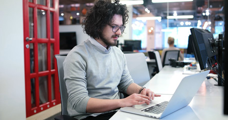 businessman working using a laptop in startup office