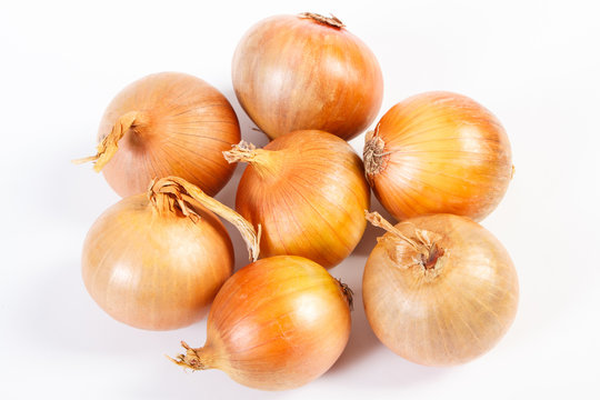 Heap of onions on white background, concept of healthy nutrition
