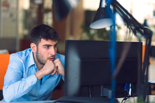Freelance programmer working in startup office
