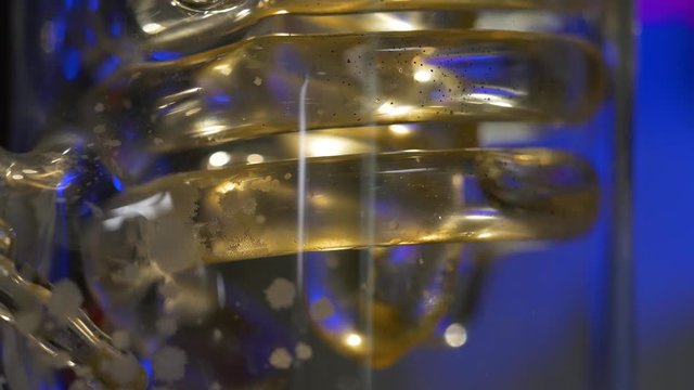 Spiral in a medical flask. Adaptation for medical experiments. spiral glass bulb or flask transport liquid