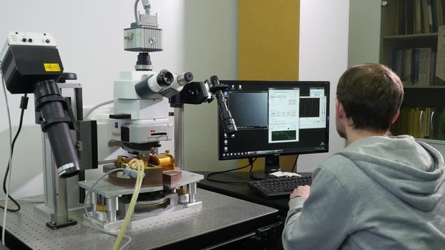 Chemical engineer working with analysis software on laptop in the research laboratory