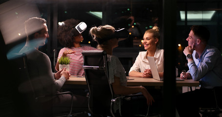 Obraz premium Multiethnic Business team using virtual reality headset