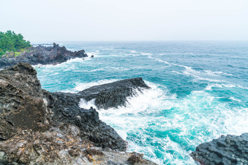 Fototapeta na wymiar Jungmun Daepo Coast Jusangjeolli Cliff, Jeju Island