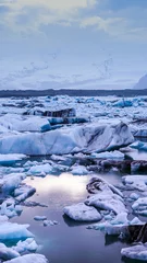 Deurstickers Gletsjers sun light reflecting on iceberg glacier lagoon, jokulsarlon of Iceland