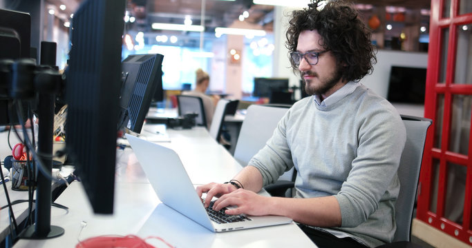 businessman working using a laptop in startup office