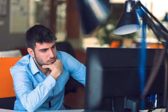 Freelance programmer working in startup office