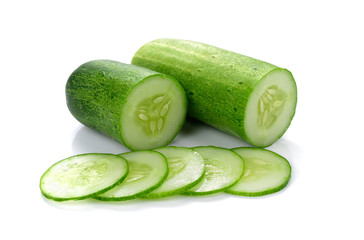 Cucumber and slices isolated over white background