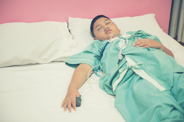 Asian boy wearing Sleep Apnea Diagnostic medical device Kit. Sleep Lab Test. - 164782857