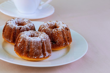 Appetizing raisins muffin and coffee