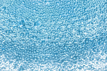water drops on blue glass