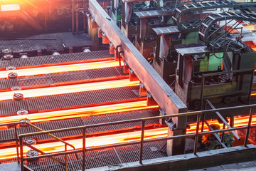 hot steel on conveyor in steel plant