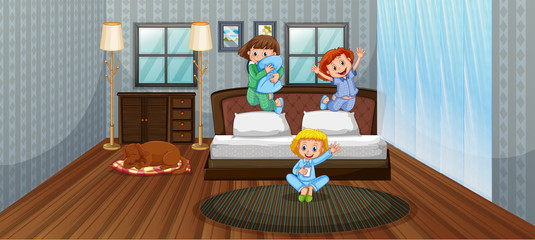 Three kids having fun in bedroom