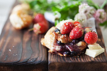 Blueberry cake decorated with fresh strawberry
