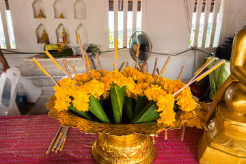 Bunch of marigold and Pandan for making merit in temple thailand.