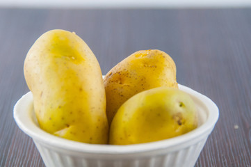 New potato isolated on white background close up