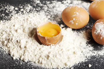Eggs on flour.