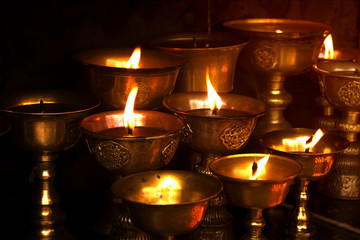 lighting a lamp for peace, Monkey temple Nepal, Monkey temple Kathmandu, Buddhist tradition,...