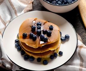 Pancakes with fresh blueberry and honey