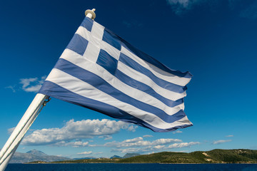 Flag of Greece with the sea
