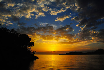 Fototapeta na wymiar Magical sunset sky and sea colors