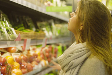 Young attractive woman in a supermarket